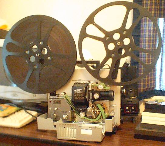 Reel Neat, Takeup reel included with the projector; now all…