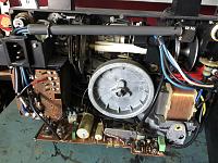 an Eumig 824 Sonomatic HQS with a dead Amp. the big capacitor C30 is clearly visible left under the flywheel